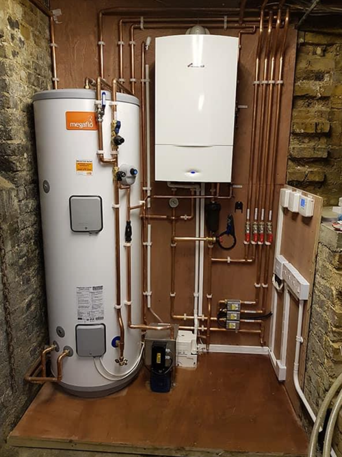 Megaflo unvented cylinder paired with combi boiler and full controls board